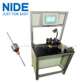 Automatic positioning armature dynamic balancing machine